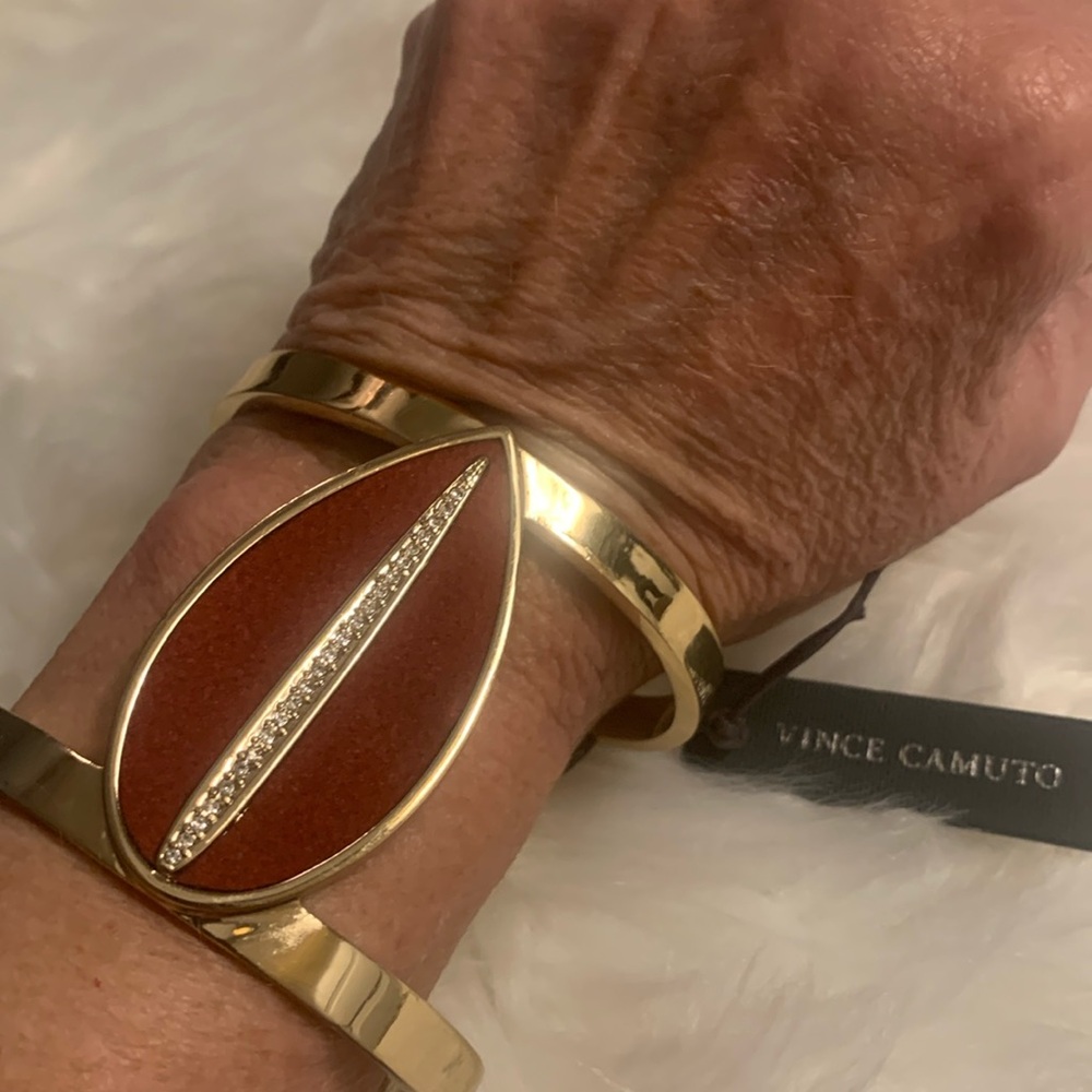 VINCE CAMUTO GOLDTONE WITH RED AND CZ Stone Bangle